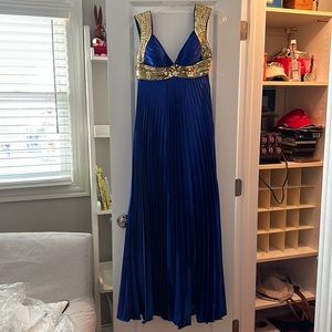 Worn once - cobalt blue with gold beading prom dress.